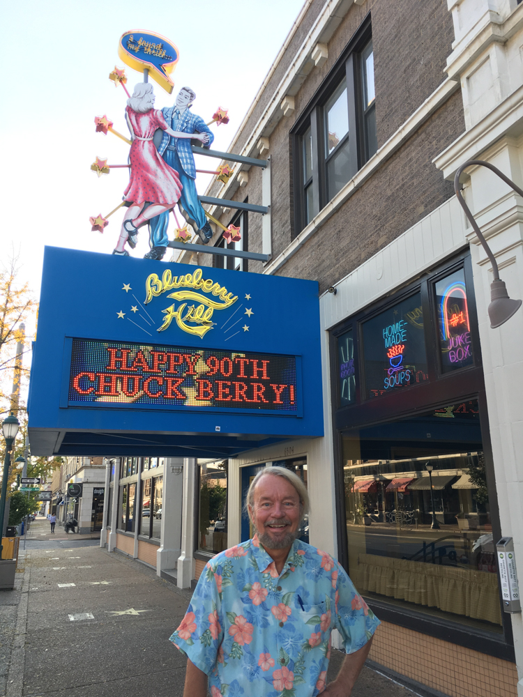 joe edwards in front of blueberry hill sign wishing chuck berry happy birthday